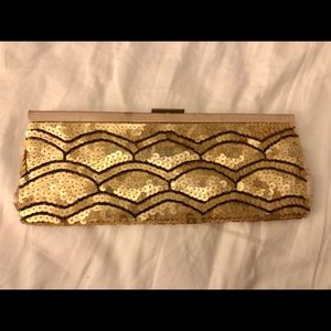 Banana Republic gold and brown sequin clutch. Bronze metal strap.
